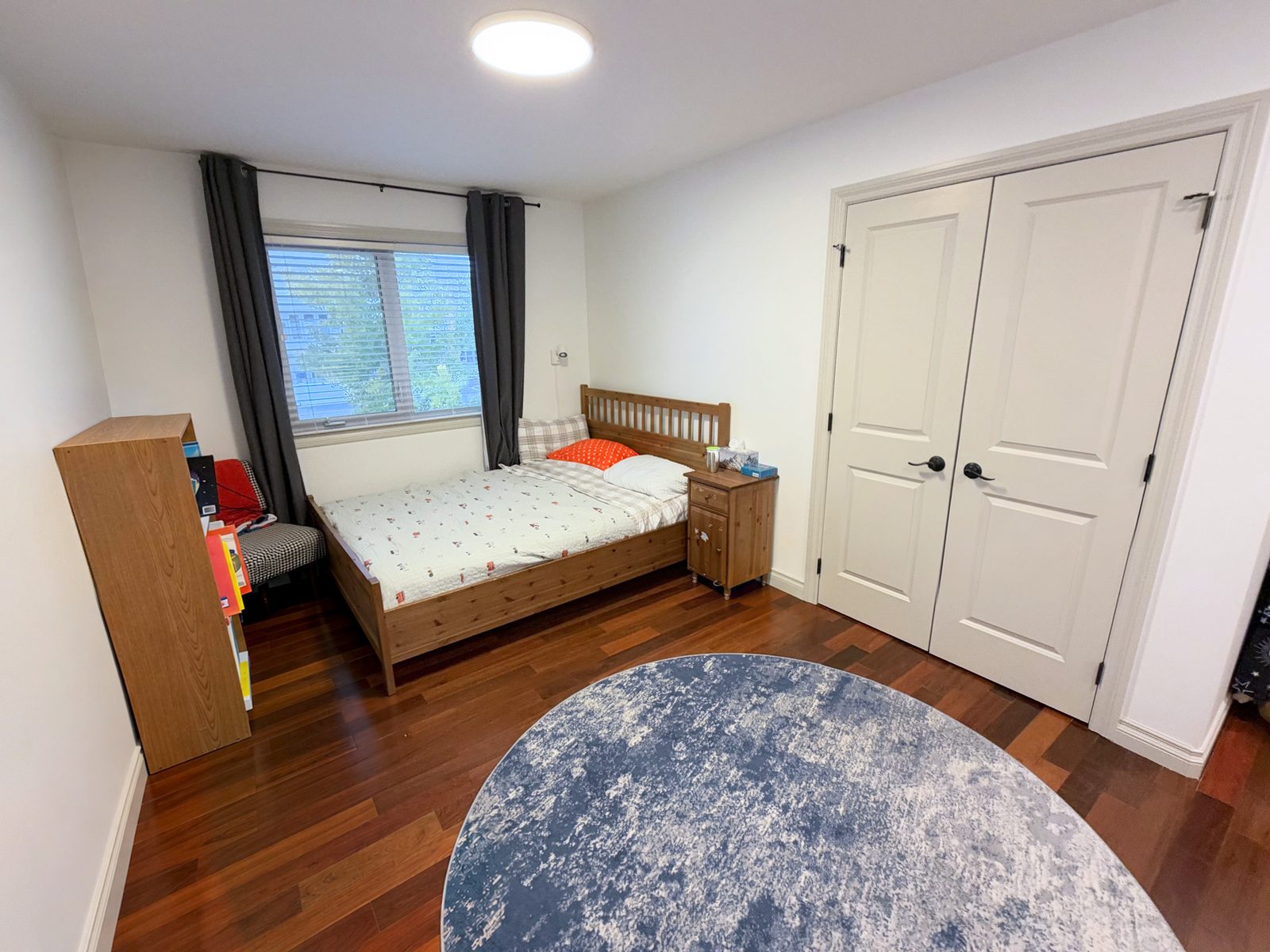 Upstairs bedroom with double closet doors